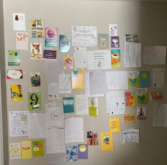 GCSSSD teachers sent personalized letters and notes of encouragement to students, which one family proudly displayed by taping them all to a wall.