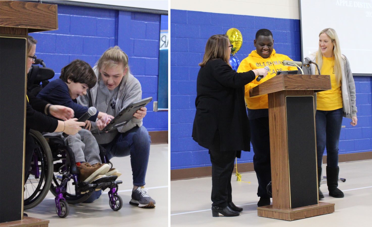 A student in a wheelchair accompanied by his teacher’s aid uses his communication device to talk about how he uses technology while the principal holds the microphone up to the device so the crowd can hear it. A student in a yellow sweatshirt stands at the podium with his teacher’s aid and the school principal and smiles as he addresses the crowd.