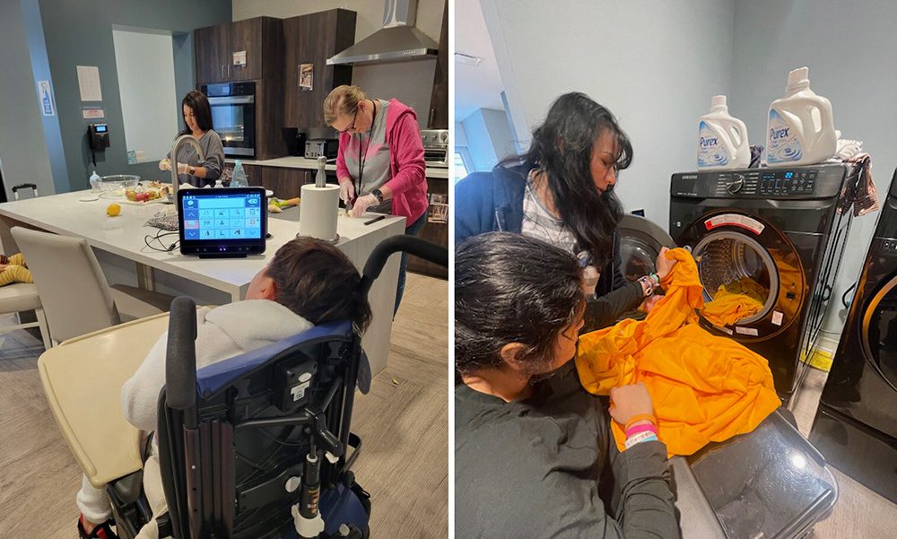 A student in a wheelchair uses an AAC device to work in the kitchen. A student is practicing laundry skills with a front-load washing machine.